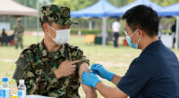 Pentagon restores mandatory flu shots for all recruits as boot camp outbreak sickens nearly 300